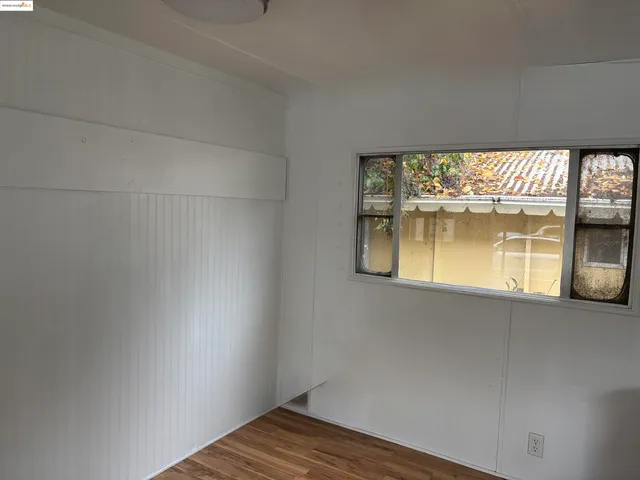a view of an empty room with window