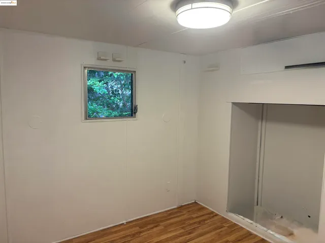a view of a bathroom with sink and shower