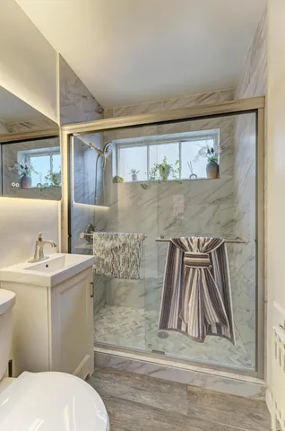 a bathroom with a sink and mirror