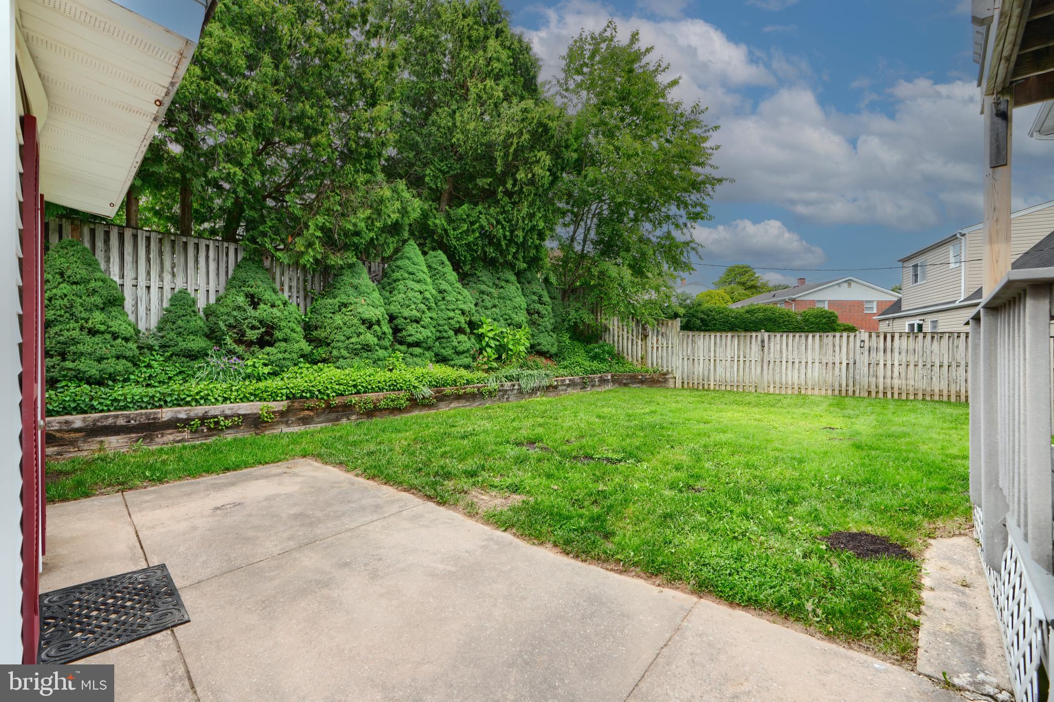 4112 Lochcarrow Road Nottingham, MD 21236 - Photo 27 of 30 a view of a backyard with a garden