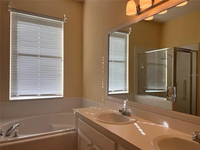 a bathroom with a sink and a bathtub