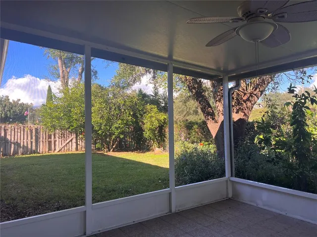 a view of a porch and garden