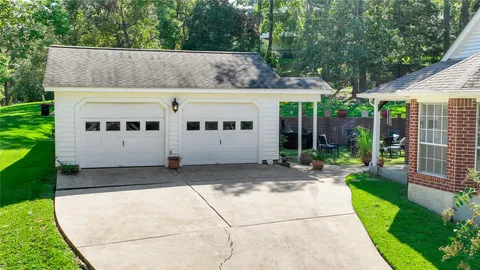 $464,900 | 220 Lake Oaks Boulevard, Coldspring, TX 77331