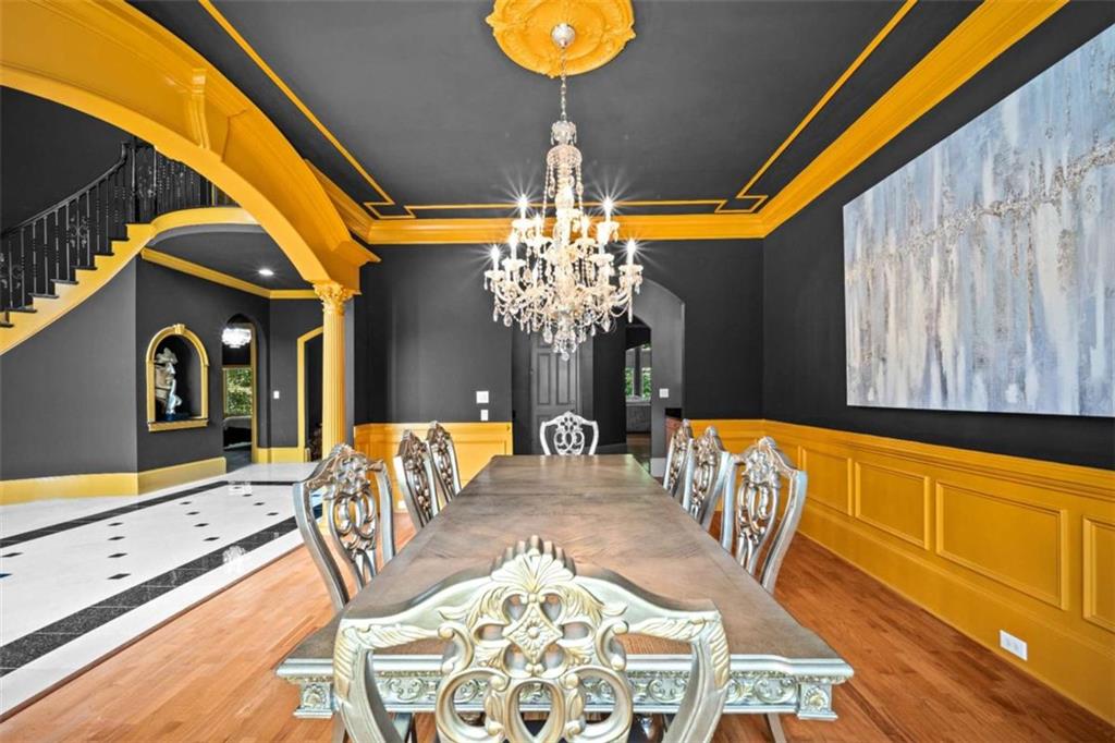 1670 Riverside Road Roswell, GA 30076 - Photo 11 of 88 a view of a dining room with furniture and chandelier