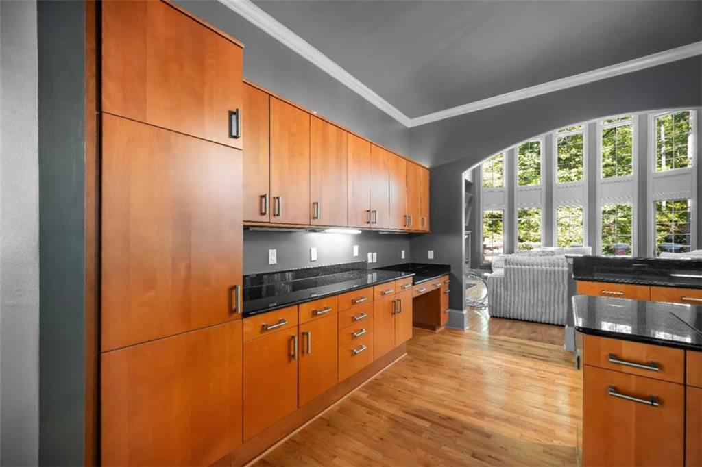 1670 Riverside Road Roswell, GA 30076 - Photo 21 of 88 a kitchen with stainless steel appliances a refrigerator sink and cabinets