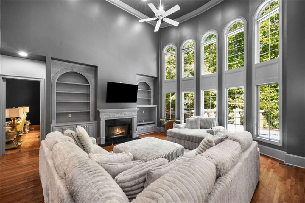 1670 Riverside Road Roswell, GA 30076 - Photo 24 of 88 a living room with furniture fireplace and a large window