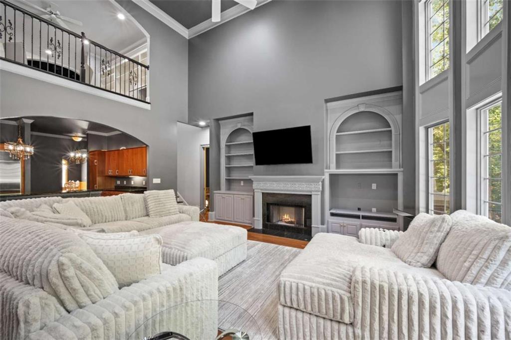 1670 Riverside Road Roswell, GA 30076 - Photo 26 of 88 a bed room with a bed and a television