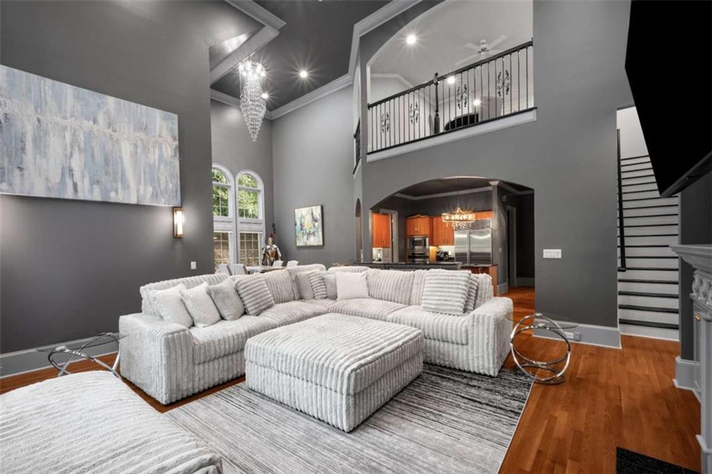 1670 Riverside Road Roswell, GA 30076 - Photo 28 of 88 a living room with furniture and a flat screen tv