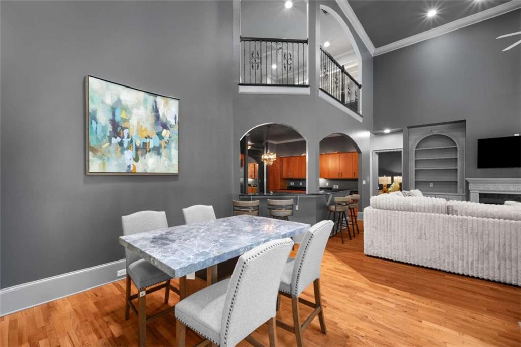 1670 Riverside Road Roswell, GA 30076 - Photo 30 of 88 a living room with furniture a dining table and kitchen view