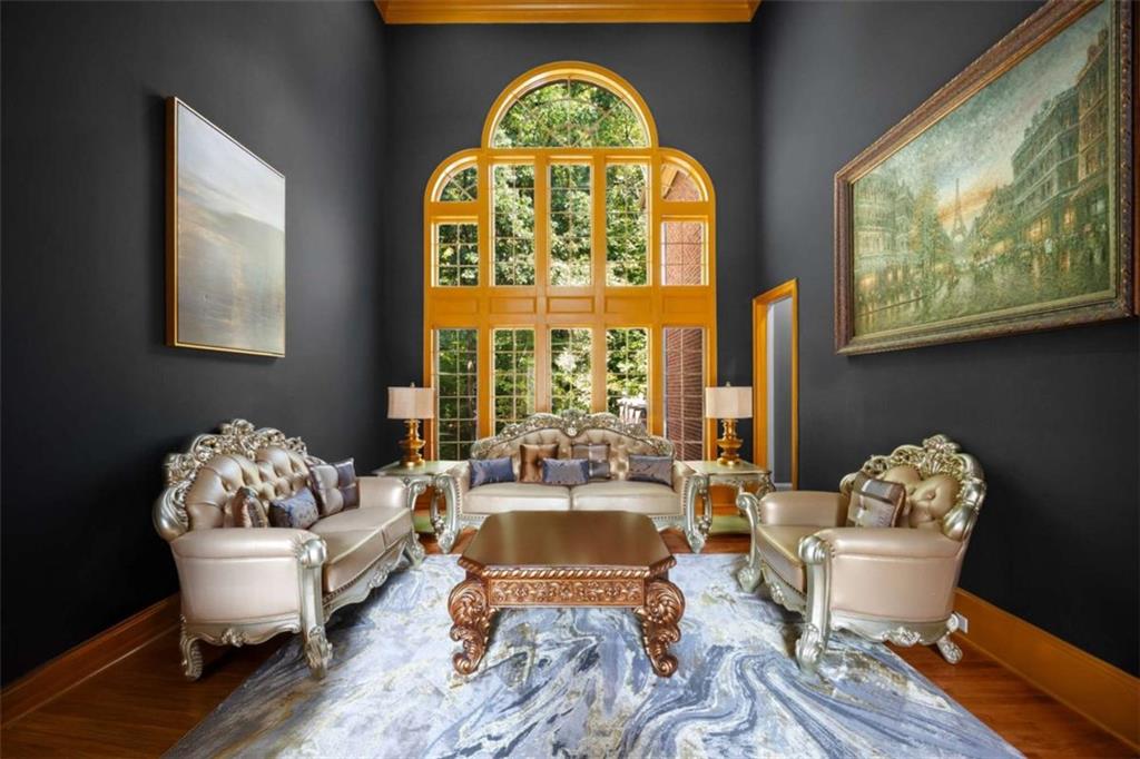 1670 Riverside Road Roswell, GA 30076 - Photo 32 of 88 a living room with furniture and a window