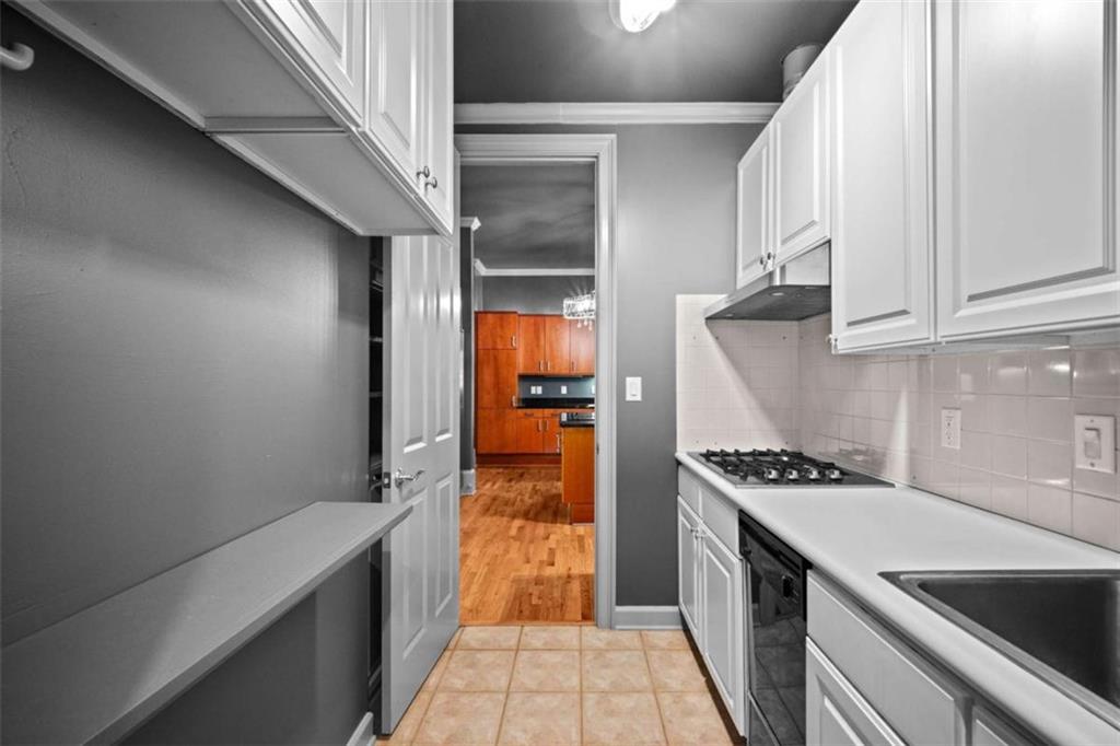 1670 Riverside Road Roswell, GA 30076 - Photo 42 of 88 a kitchen with stainless steel appliances a refrigerator a stove and a sink