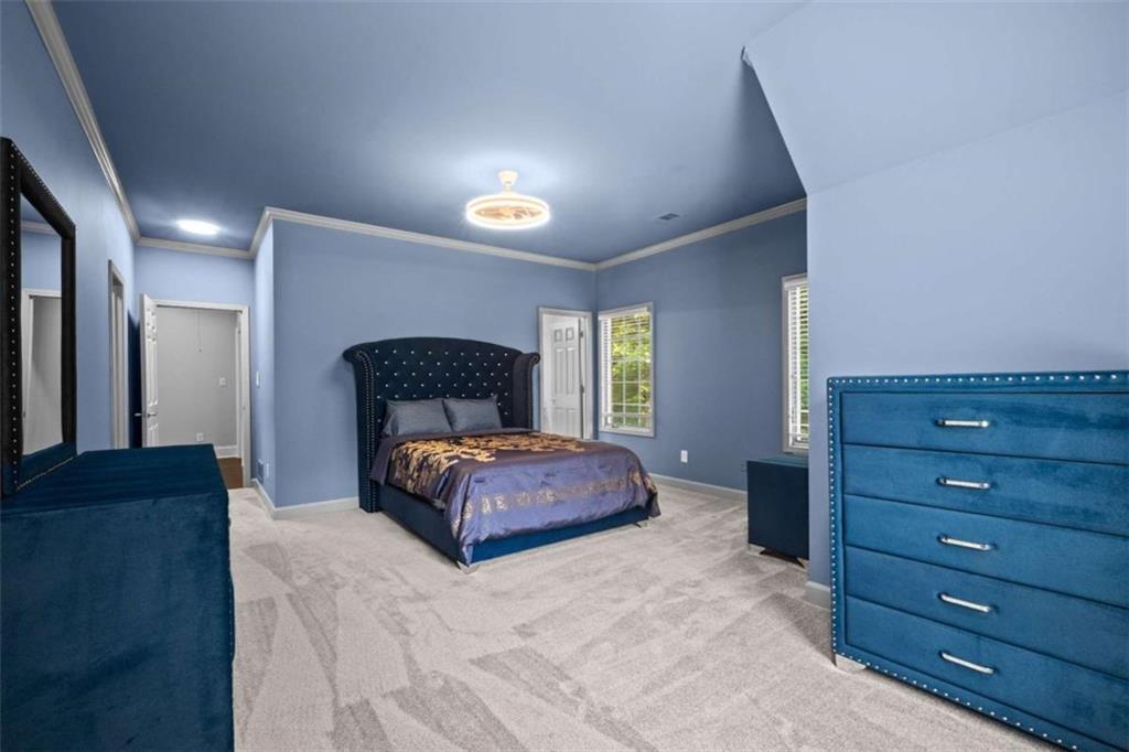 1670 Riverside Road Roswell, GA 30076 - Photo 54 of 88 a bedroom with a bed and a dresser