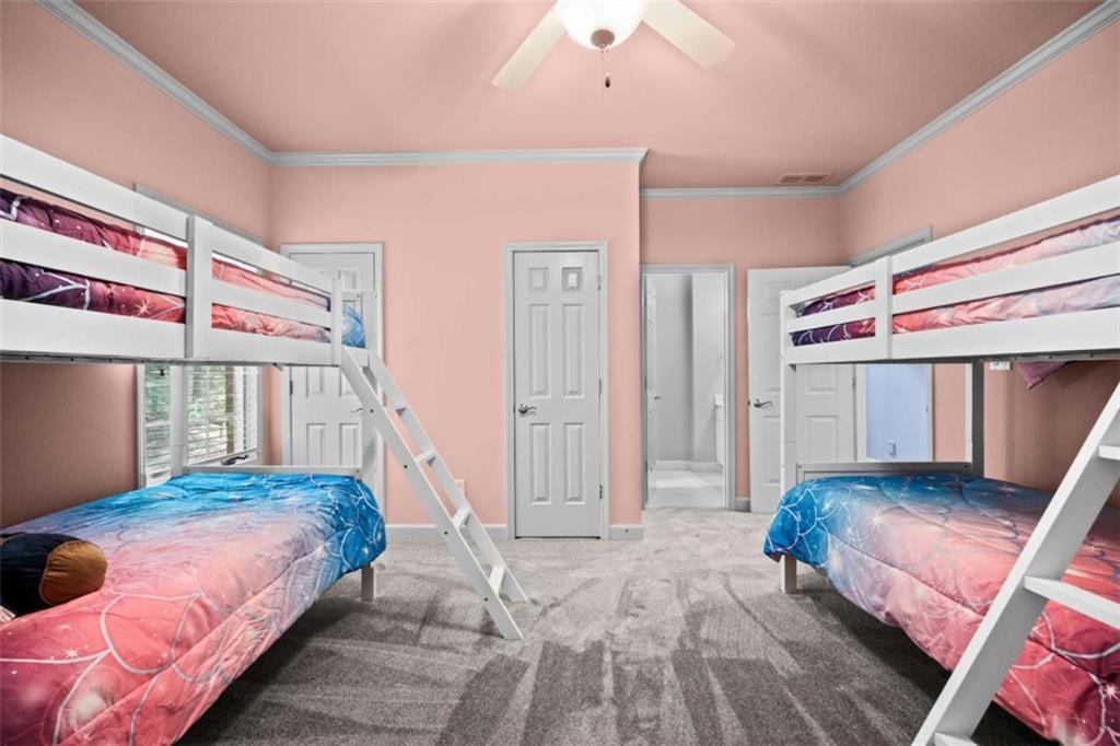 1670 Riverside Road Roswell, GA 30076 - Photo 57 of 88 a bedroom with a bed and a window