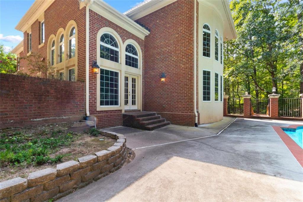 1670 Riverside Road Roswell, GA 30076 - Photo 78 of 88 a view of a house with a yard