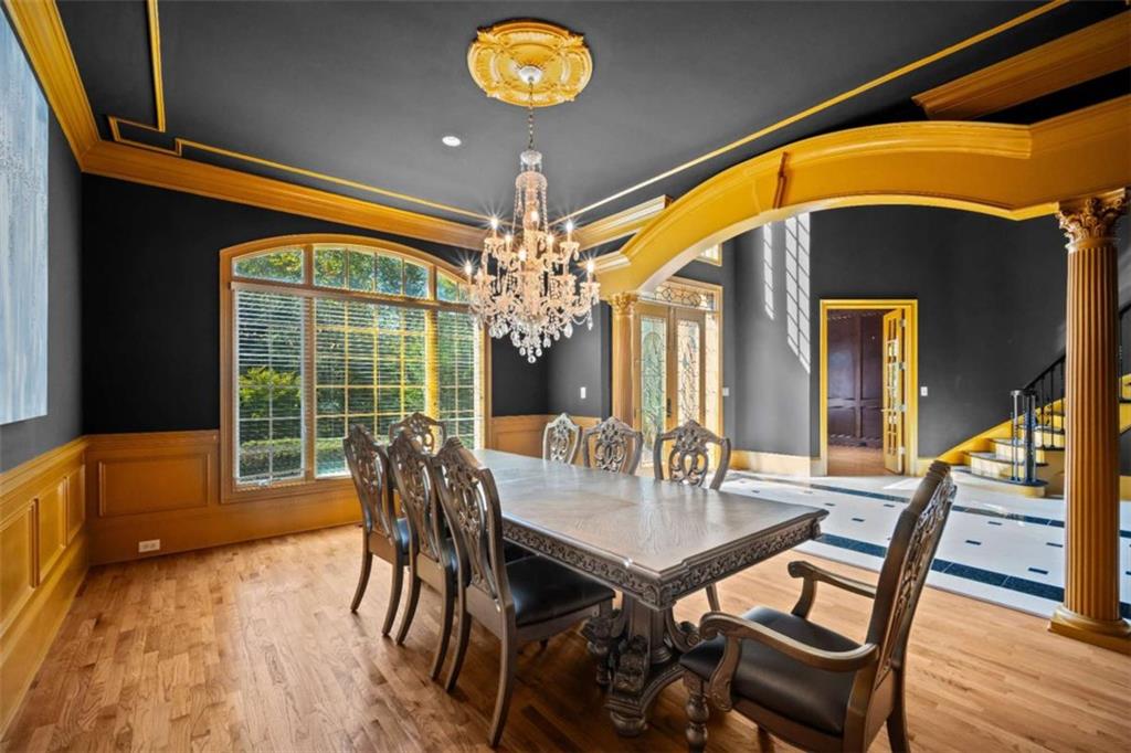 1670 Riverside Road Roswell, GA 30076 - Photo 9 of 88 a view of a dining room with furniture window and wooden floor