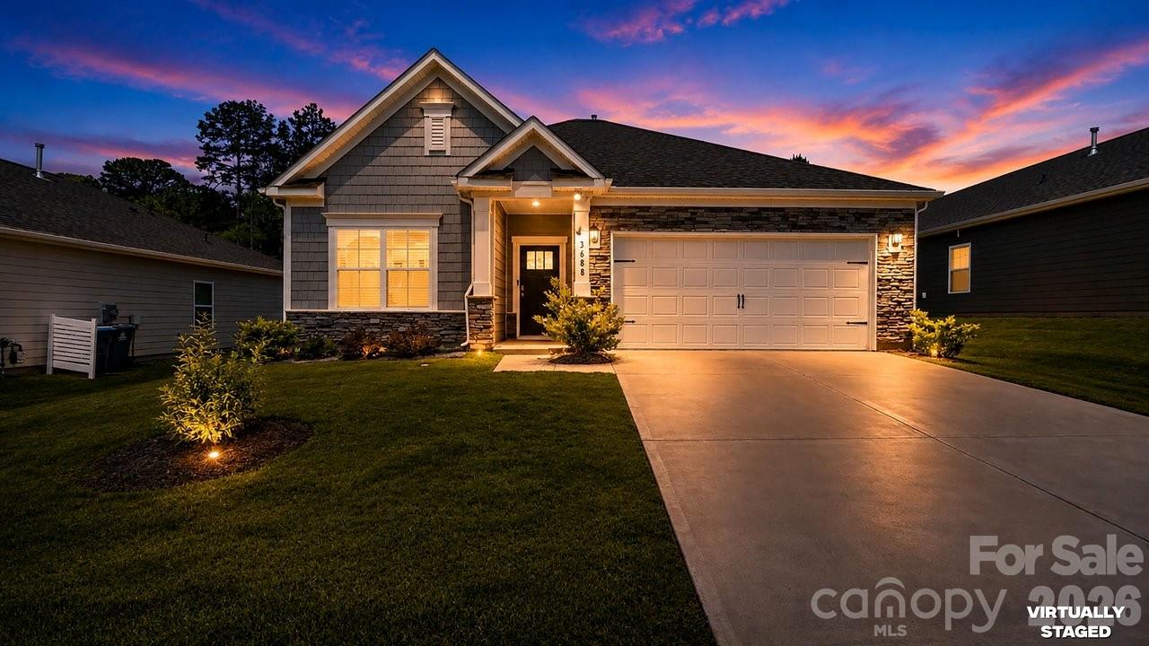 3688 Mercer Street Terrell, NC 28682 - Photo 1 of 34 a front view of a house with a yard