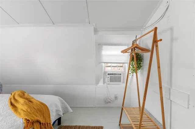 a bathroom with a tub and shower