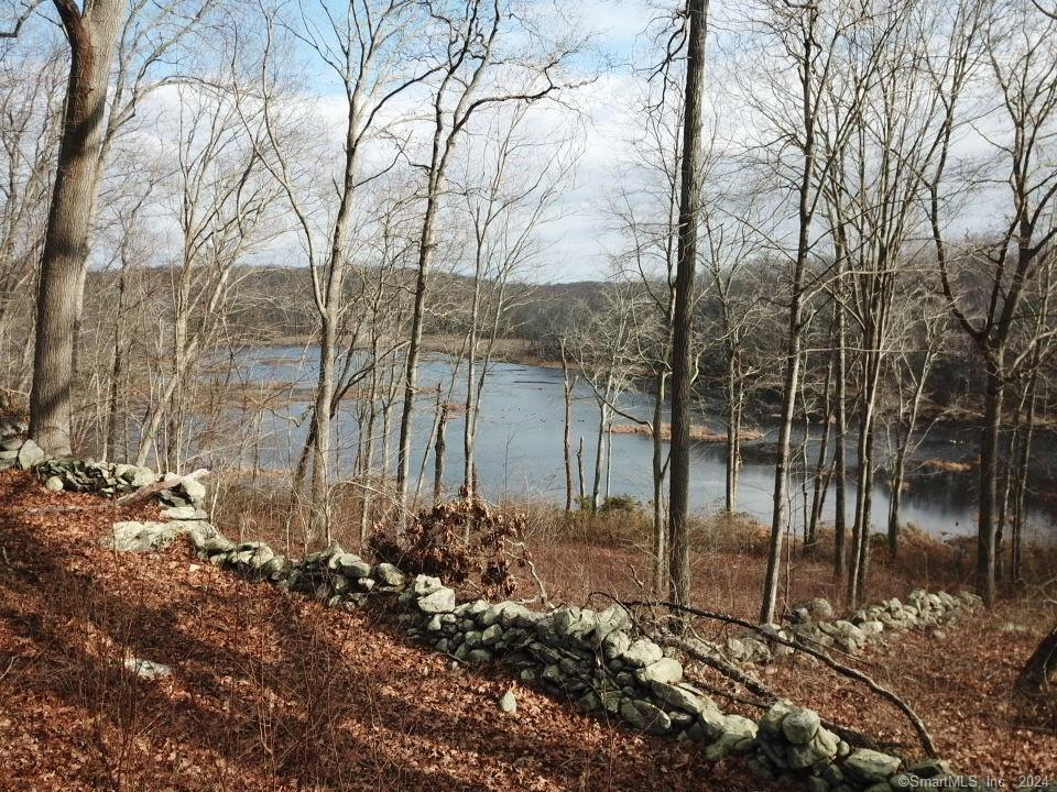 1 Houperts Way Clinton, CT 06413 - Photo 2 of 17 a backyard of a house with lots of green space
