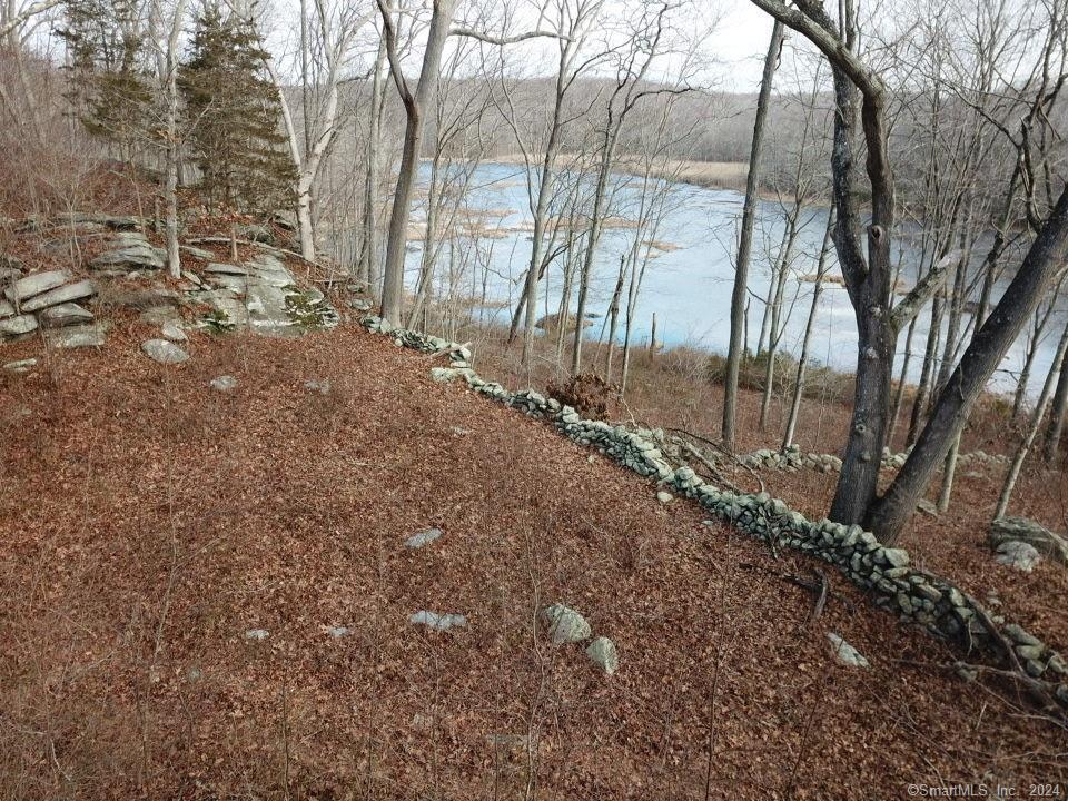 1 Houperts Way Clinton, CT 06413 - Photo 6 of 17 a view of a backyard of the house