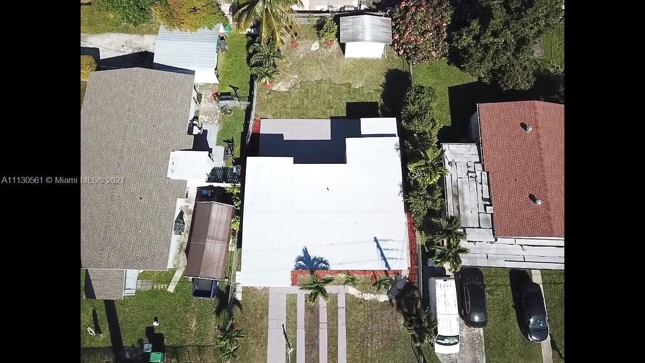 8935 Southwest 38th Street Miami, FL 33165 - Photo 22 of 24 an aerial view of houses with outdoor space