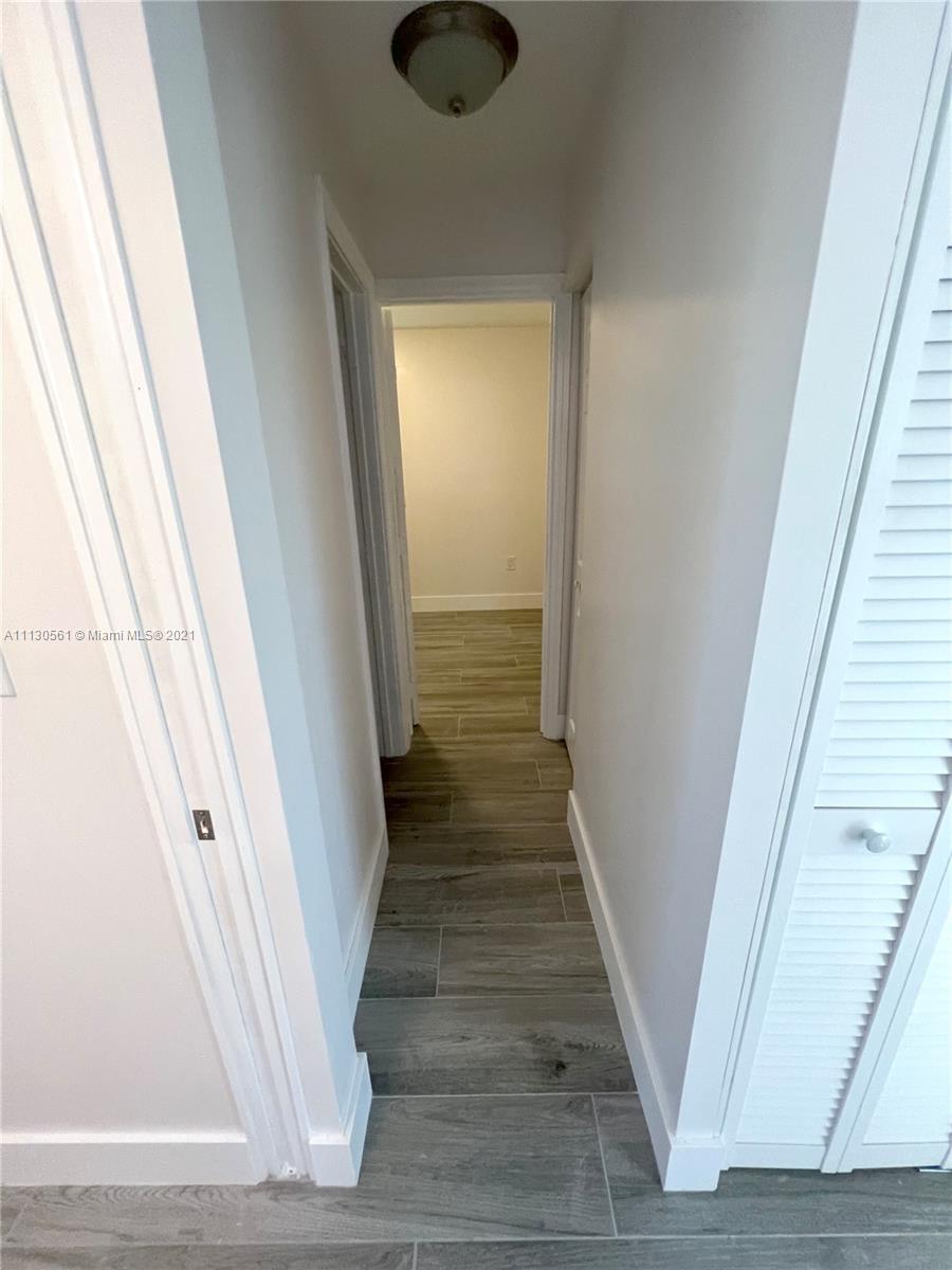 8935 Southwest 38th Street Miami, FL 33165 - Photo 9 of 24 a view of a hallway