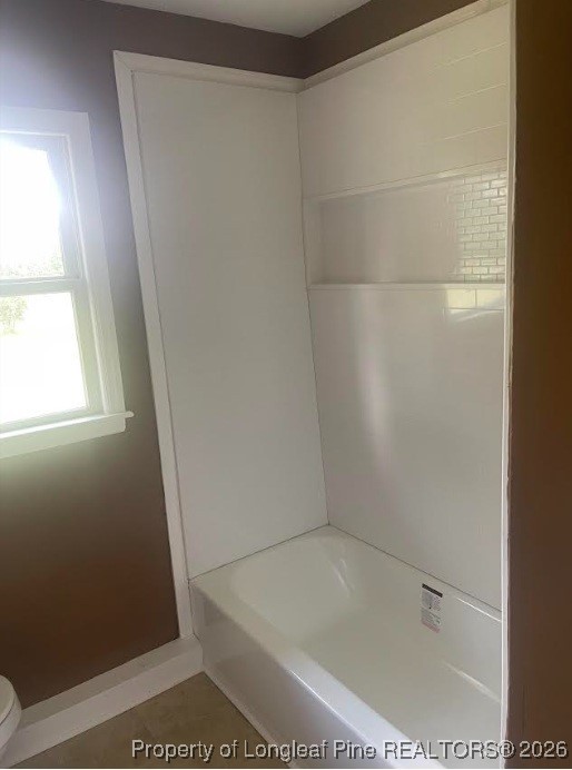 1374 McLean Chapel Church Road Bunnlevel, NC 28323 - Photo 12 of 17 a bathroom with a bathtub