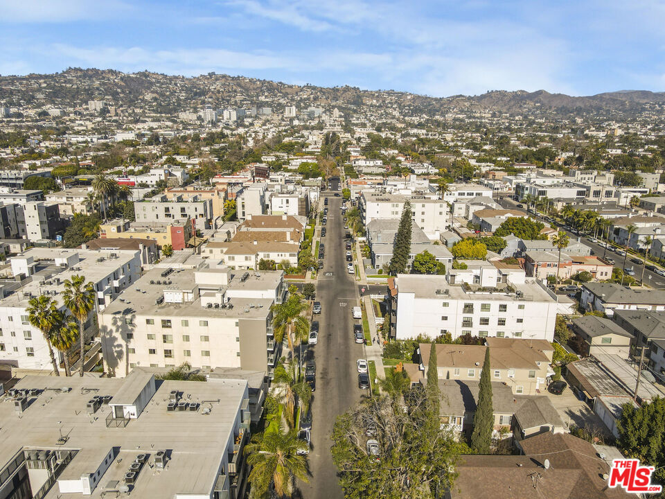116 South Kings Road Los Angeles, CA 90048 - Photo 8 of 12 an aerial view of residential houses with city view