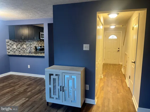 a view of livingroom with furniture and wooden floor