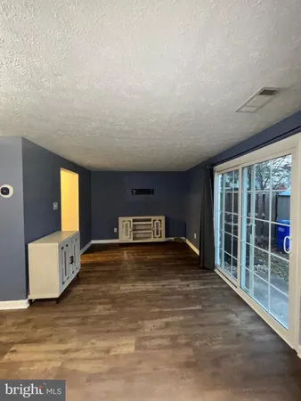 an empty room with a bathroom