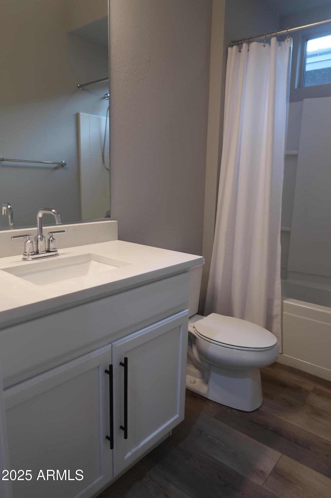 2852 East Robin Lane Phoenix, AZ 85050 - Photo 24 of 58 a bathroom with a sink toilet and shower