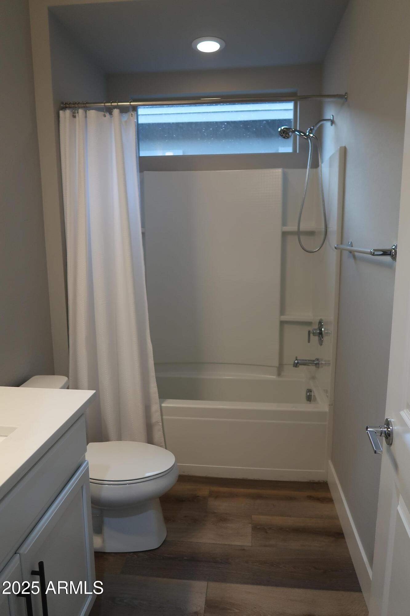 2852 East Robin Lane Phoenix, AZ 85050 - Photo 25 of 58 a bathroom with a toilet and a shower