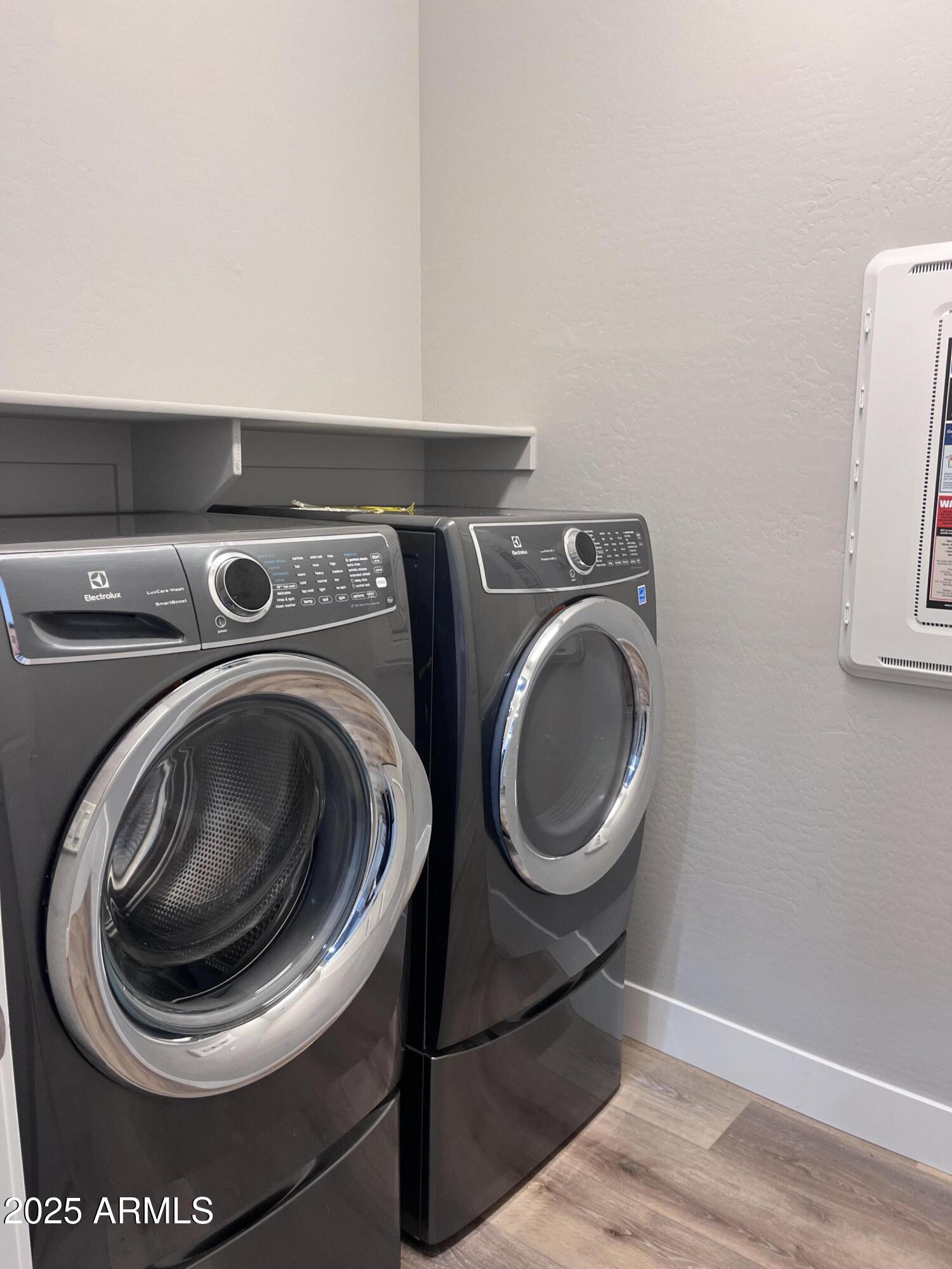 2852 East Robin Lane Phoenix, AZ 85050 - Photo 28 of 58 a utility room with dryer and washer