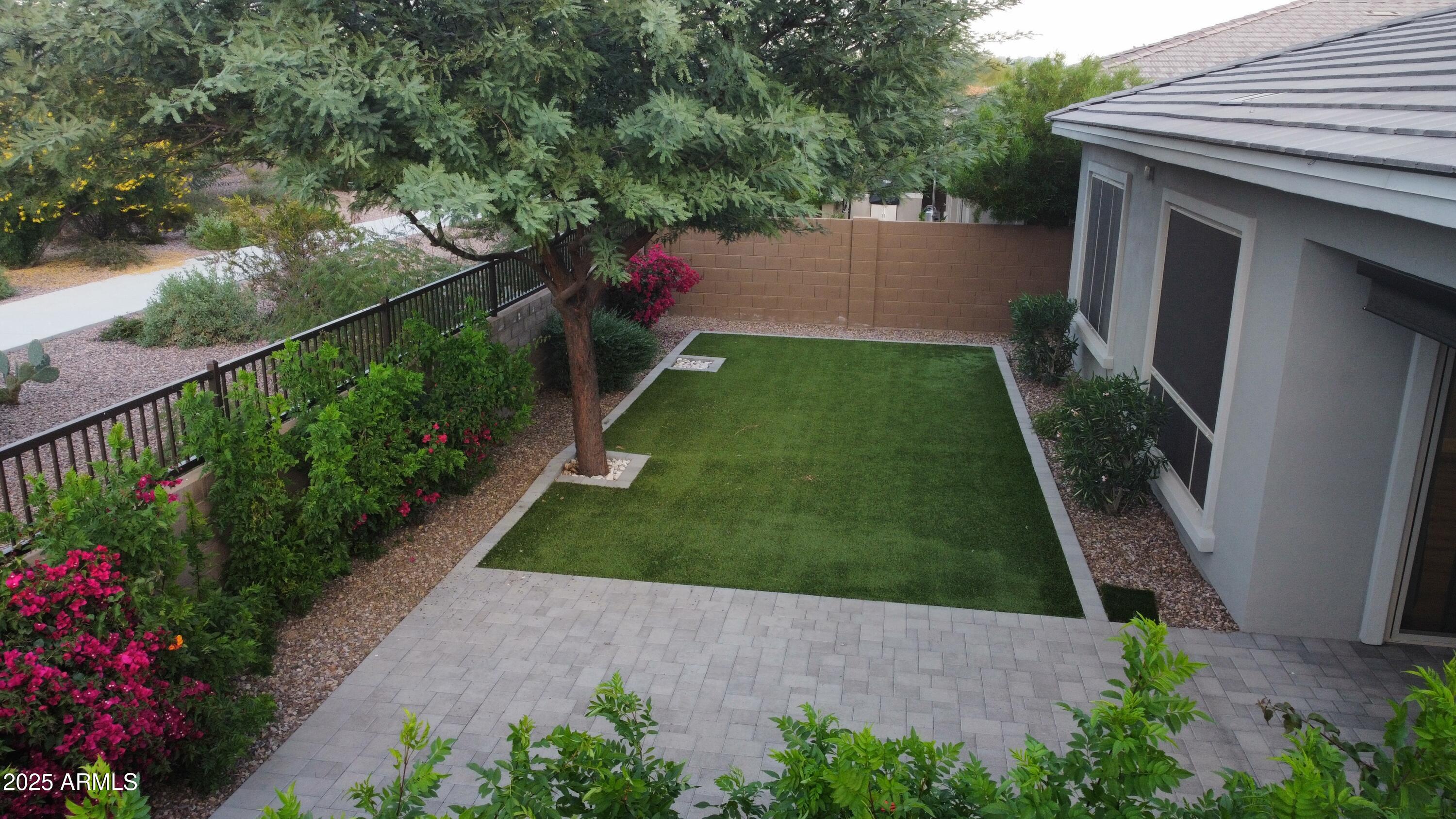 2852 East Robin Lane Phoenix, AZ 85050 - Photo 30 of 58 a view of a garden with pathway