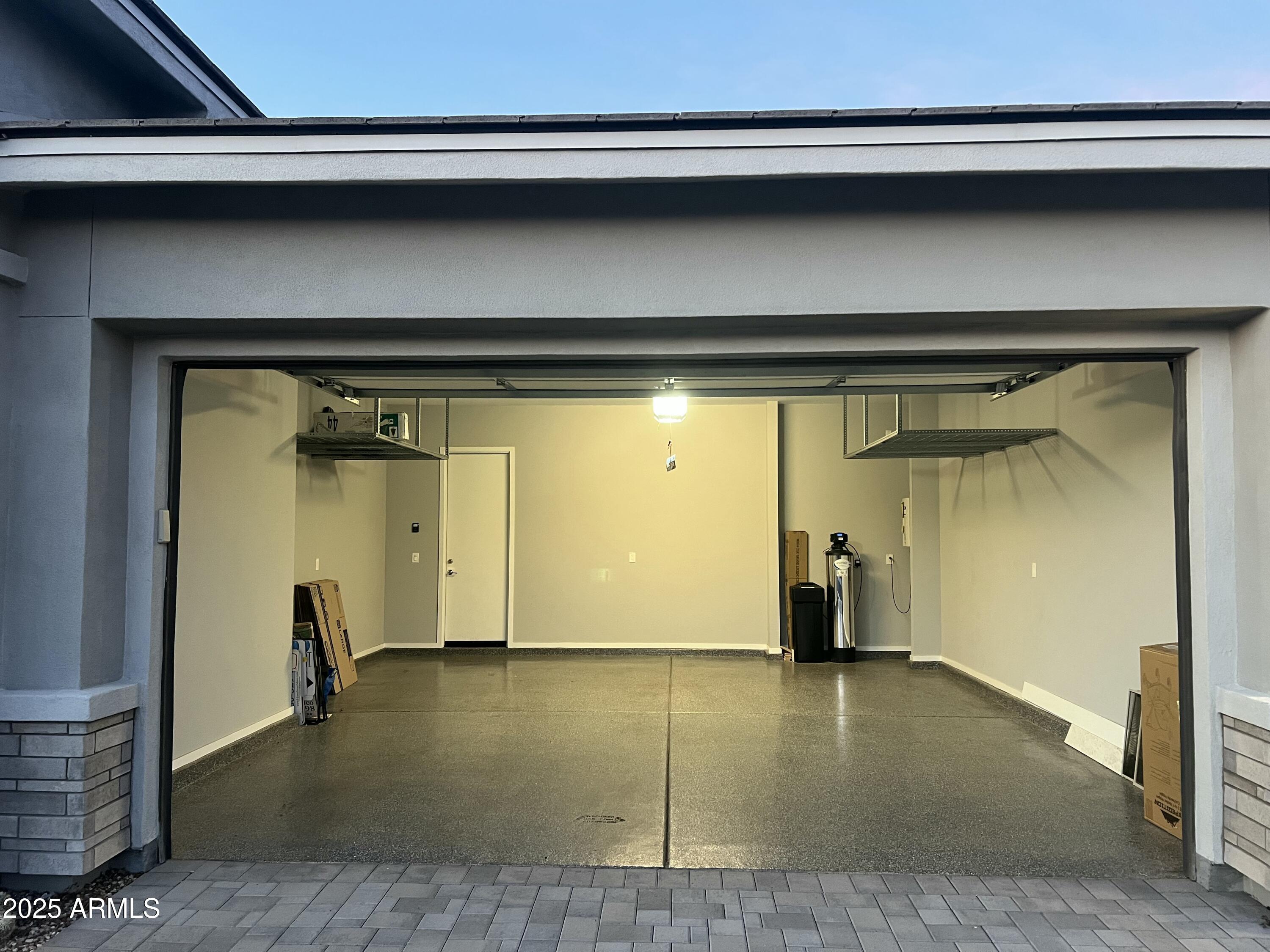 2852 East Robin Lane Phoenix, AZ 85050 - Photo 34 of 58 a view of empty room with wooden floor