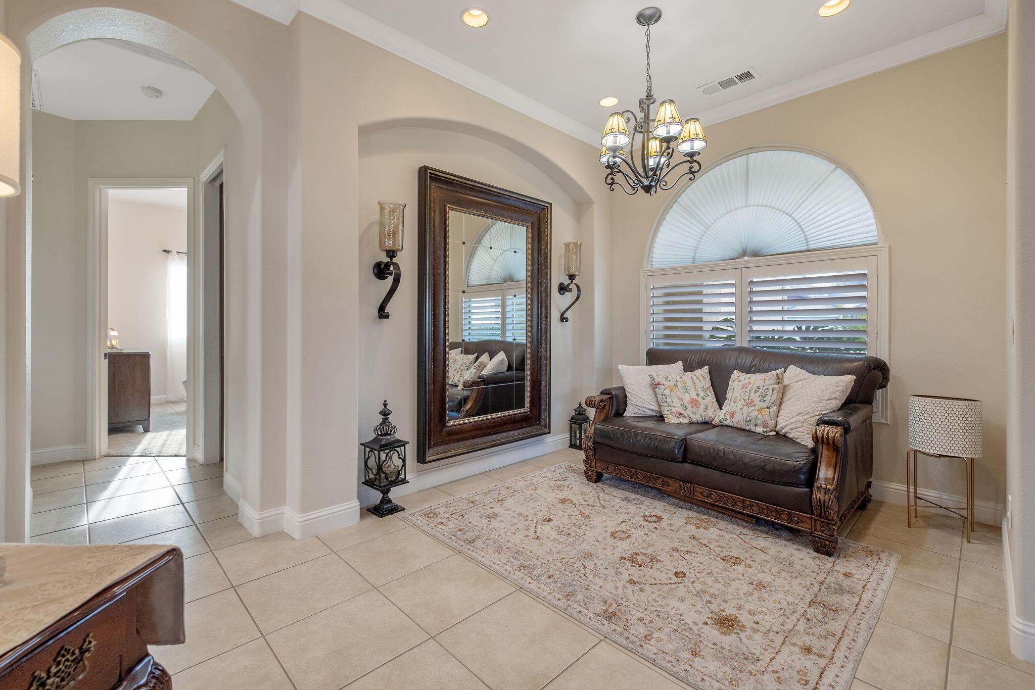 729 St Thomas Court Exeter, CA 93221 - Photo 23 of 66 a living room with furniture a chandelier and a chandelier
