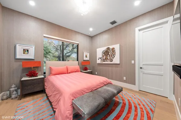 a bedroom with a bed and furniture
