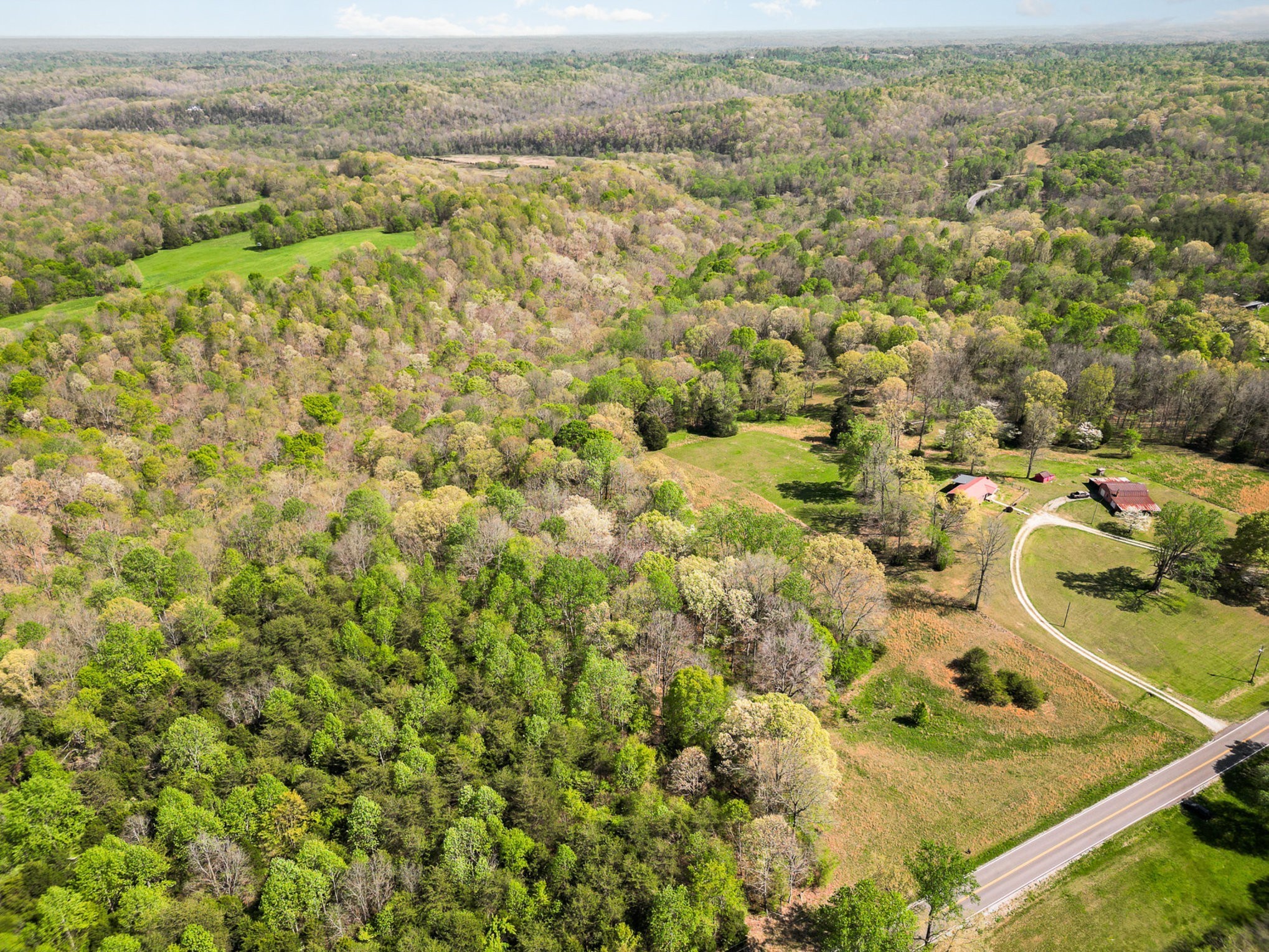 0 Bowker Road Charlotte, TN 37036 - Photo 8 of 10 an aerial view of residential houses with outdoor space