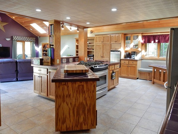 75 Brooks Village Road Phillipston, MA 01331 - Photo 12 of 30 a kitchen with stainless steel appliances granite countertop a stove oven and a refrigerator