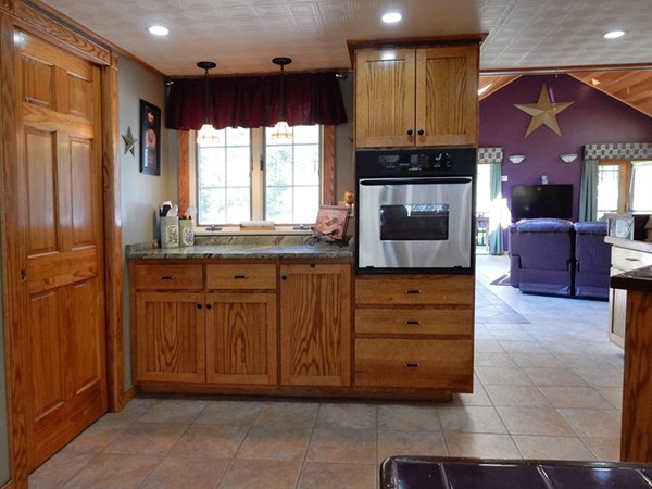 75 Brooks Village Road Phillipston, MA 01331 - Photo 13 of 30 a kitchen with stainless steel appliances granite countertop a stove a refrigerator and a sink