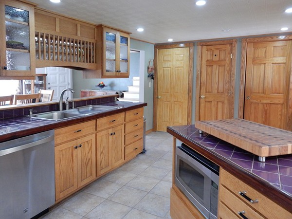 75 Brooks Village Road Phillipston, MA 01331 - Photo 16 of 30 a kitchen with granite countertop a sink stainless steel appliances and cabinets