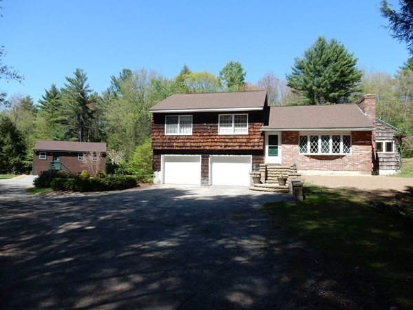 75 Brooks Village Road Phillipston, MA 01331 - Photo 2 of 30 a front view of a house with a garden