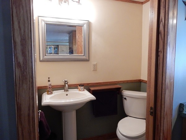 75 Brooks Village Road Phillipston, MA 01331 - Photo 28 of 30 a bathroom with a toilet sink and mirror