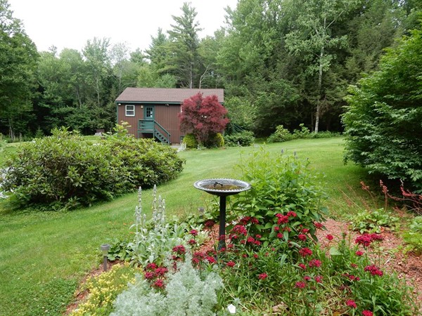 75 Brooks Village Road Phillipston, MA 01331 - Photo 3 of 30 a view of a garden with a flower garden
