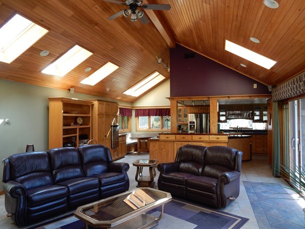 75 Brooks Village Road Phillipston, MA 01331 - Photo 9 of 30 a living room with furniture a ceiling fan and a window