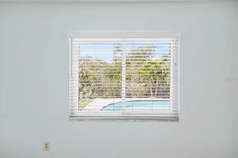 a view of empty room with a window