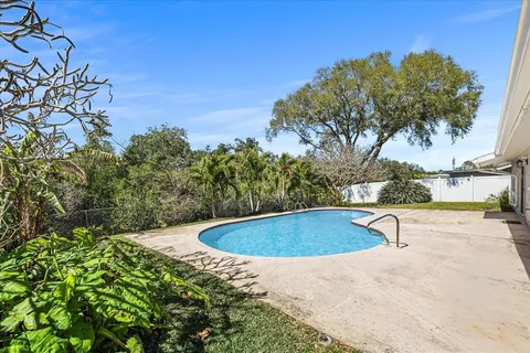 a view of outdoor space and swimming pool