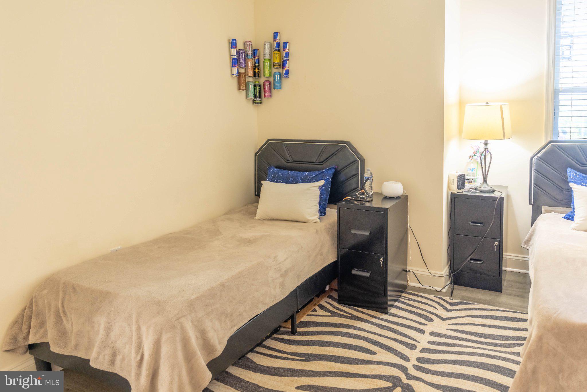 12824 Clarksburg Square Road, Unit 105 Clarksburg, MD 20871 - Photo 67 of 96 Cozy bedroom with modern accents.