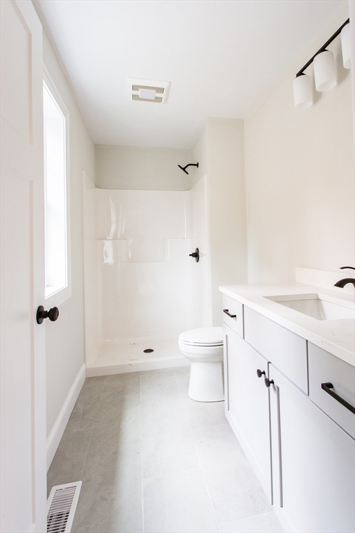 8 Foster Road West Brookfield, MA 01585 - Photo 15 of 29 a bathroom with a toilet sink and a shower