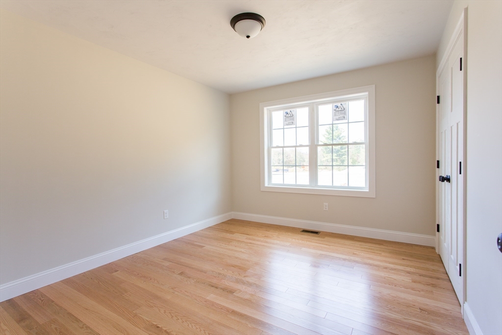8 Foster Road West Brookfield, MA 01585 - Photo 18 of 29 wooden floor in an empty room with a window