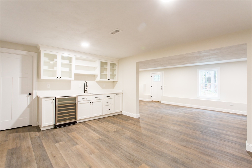 8 Foster Road West Brookfield, MA 01585 - Photo 22 of 29 a view of a kitchen with wooden floor and electronic appliances